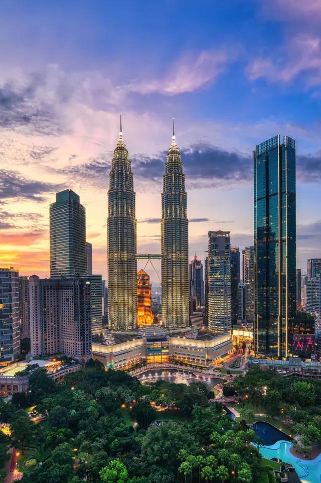 Petronas Towers in Kuala Lumpur at dusk
